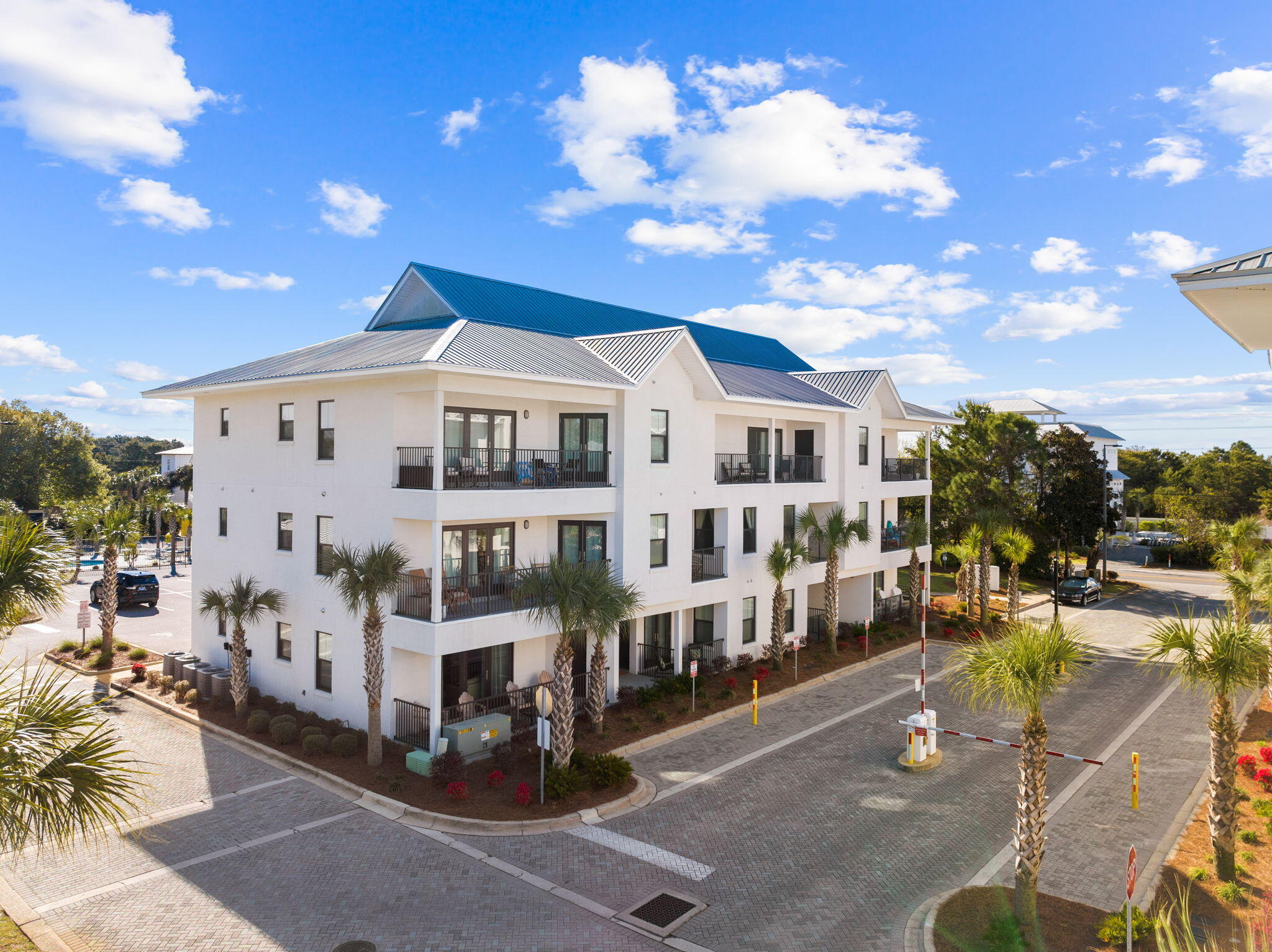 3958 West County Highway 30A, Unit 112 Santa Rosa Beach, FL 32459 - Photo 37 of 45 a front view of a house with a yard