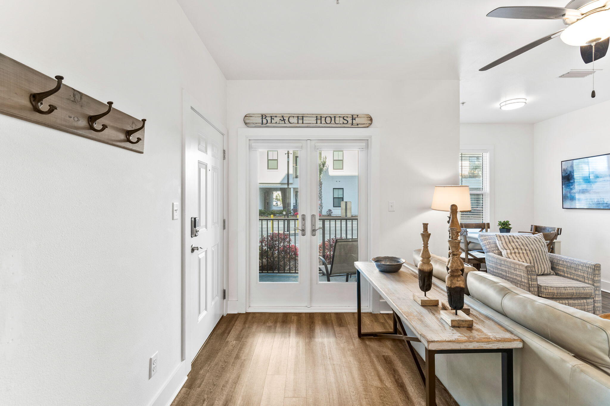 3958 West County Highway 30A, Unit 112 Santa Rosa Beach, FL 32459 - Photo 5 of 45 a living room with furniture and a wooden floor