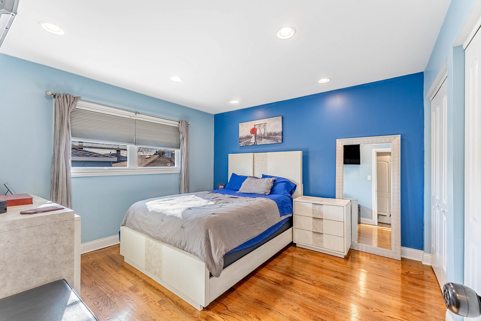 3605 West 56th Place Chicago, IL 60629 - Photo 14 of 23 a bedroom with a bed and window