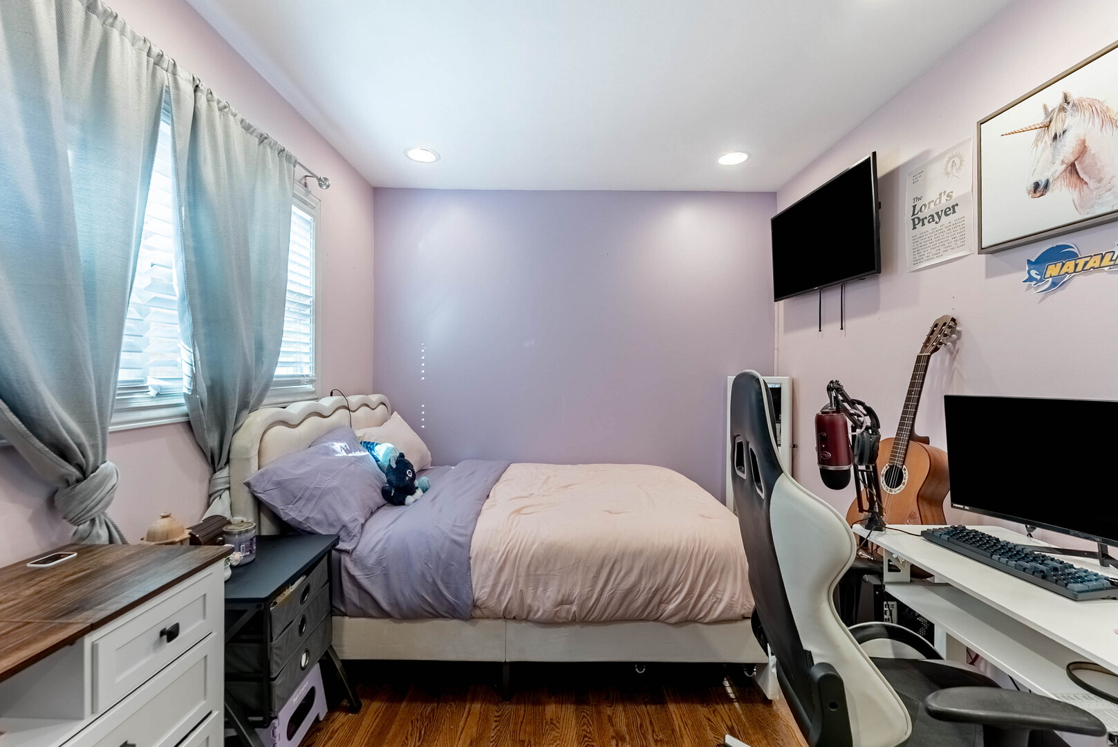 3605 West 56th Place Chicago, IL 60629 - Photo 16 of 23 a bedroom with a bed and a flat screen tv