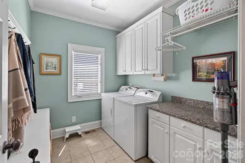a utility room with a window dryer and washer