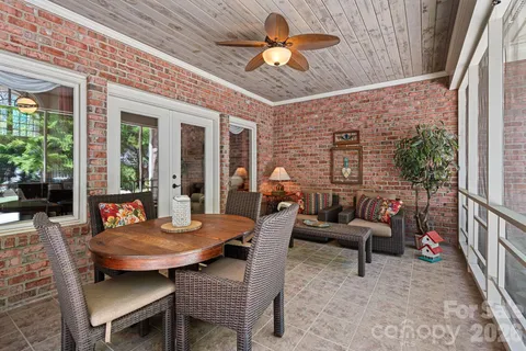 a outdoor space with patio the couches and a dining table with the garden view