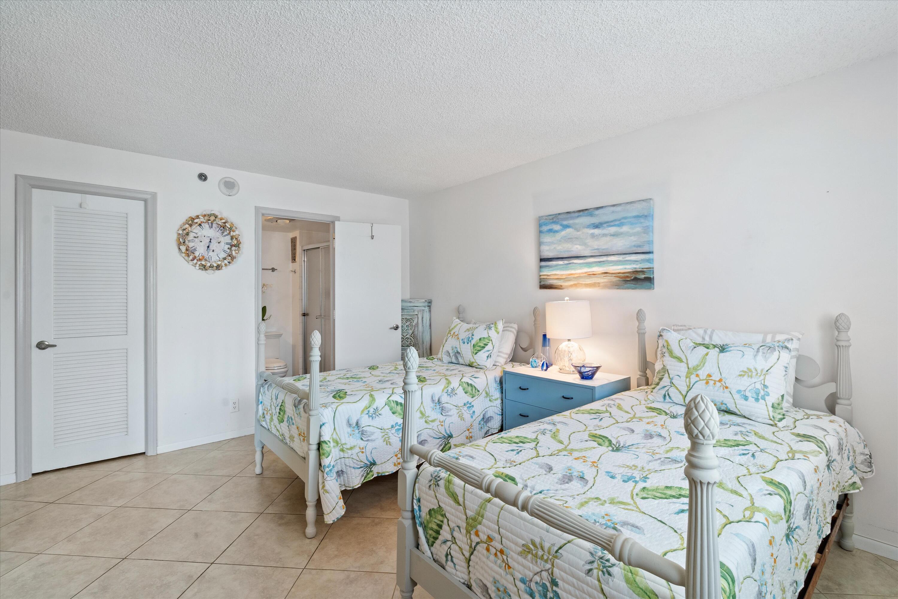 3301 South Ocean Boulevard, Unit 808 Highland Beach, FL 33487 - Photo 14 of 33 a bedroom with furniture and a large mirror