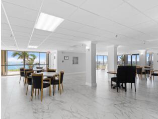 3301 South Ocean Boulevard, Unit 808 Highland Beach, FL 33487 - Photo 27 of 33 a view of a dining room with furniture