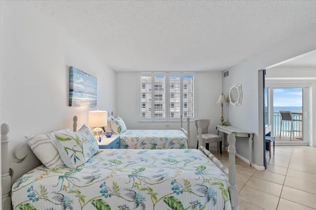 a view of a balcony with chairs