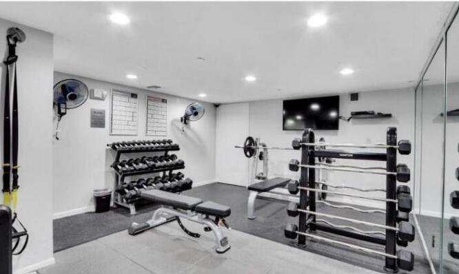3301 South Ocean Boulevard, Unit 808 Highland Beach, FL 33487 - Photo 31 of 33 a view of a room with gym equipment