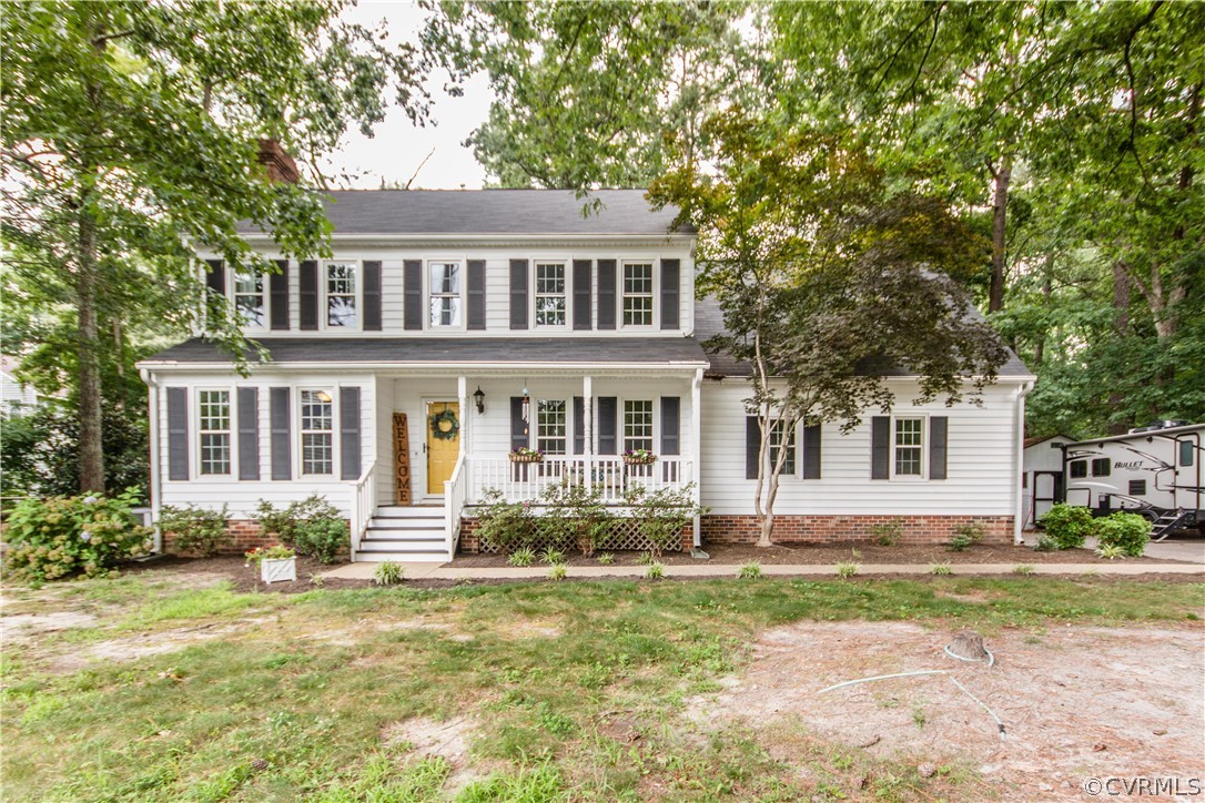 front view of a house with a yard