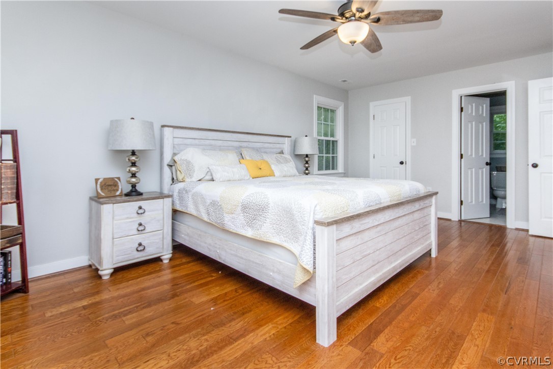 3902 Paces Ferry Road Chester, VA 23831 - Photo 11 of 31 a bed room with a bed and a chandelier