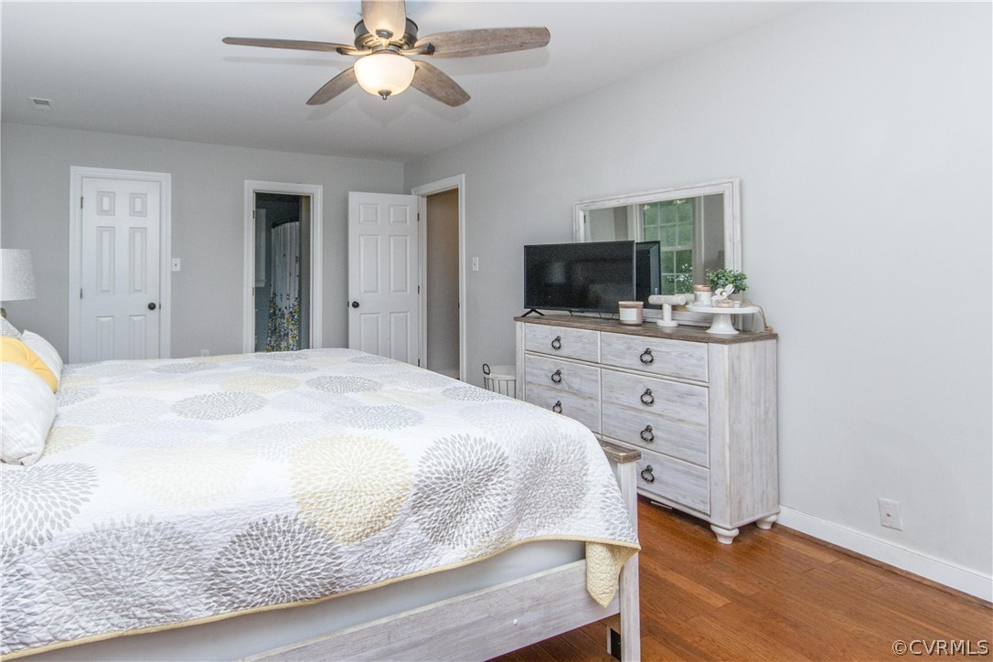 3902 Paces Ferry Road Chester, VA 23831 - Photo 12 of 31 a bedroom with a bed and a flat screen tv