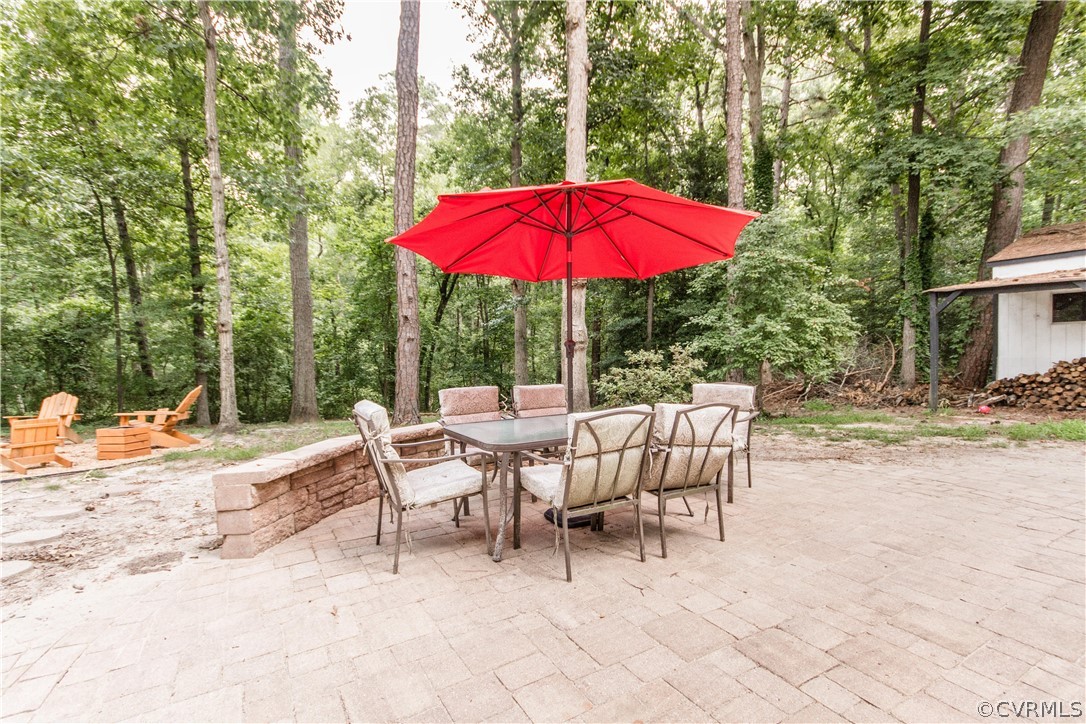 3902 Paces Ferry Road Chester, VA 23831 - Photo 26 of 31 a view of a house with backyard and sitting area
