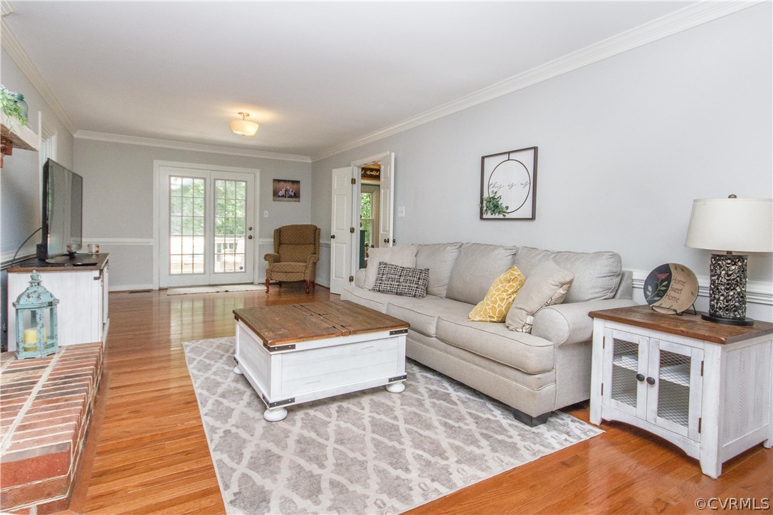 3902 Paces Ferry Road Chester, VA 23831 - Photo 3 of 31 a living room with furniture and a flat screen tv