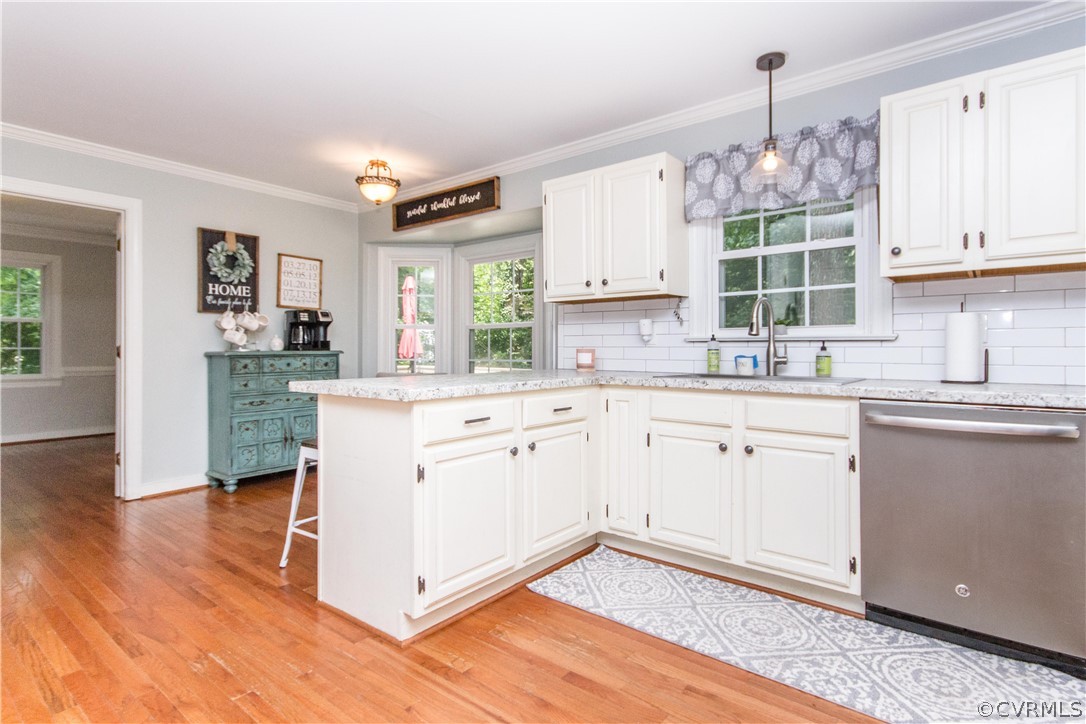 3902 Paces Ferry Road Chester, VA 23831 - Photo 5 of 31 a kitchen with a sink cabinets stainless steel appliances and a window