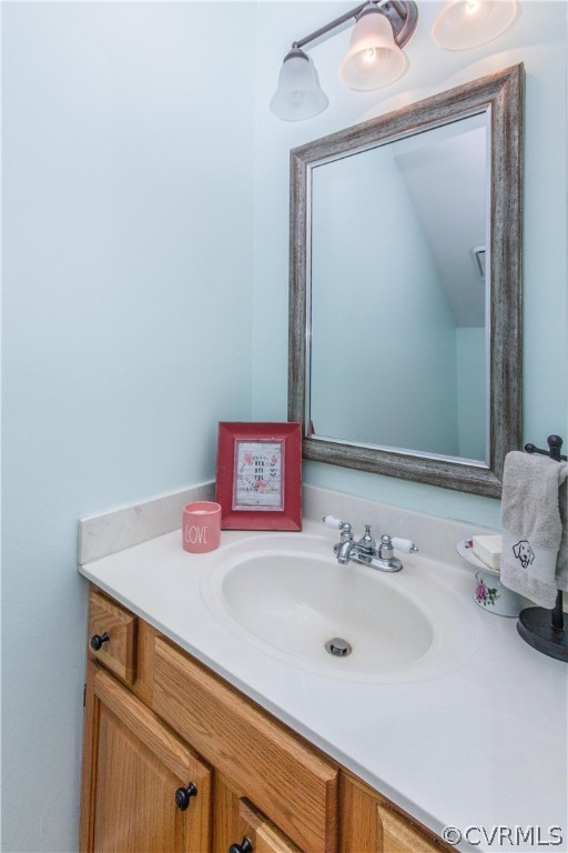 3902 Paces Ferry Road Chester, VA 23831 - Photo 10 of 31 a bathroom with a sink and a mirror
