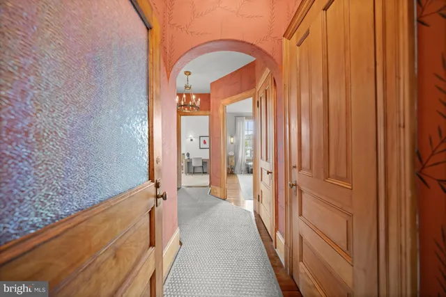 a view of a bathroom with sink and shower
