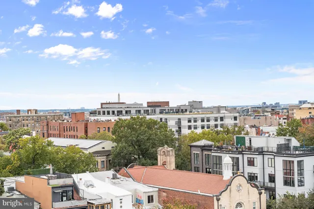 a view of a city that has tall buildings