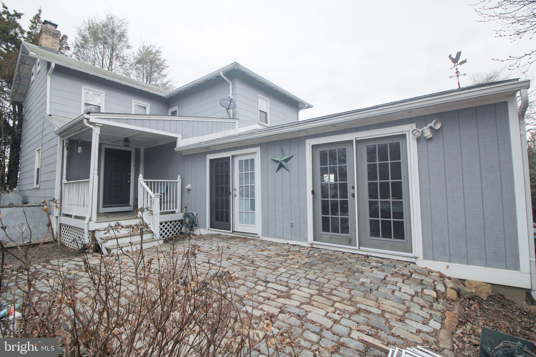 160 Funk Road Port Deposit, MD 21904 - Photo 13 of 51 a front view of house with yard outdoor seating and barbeque oven