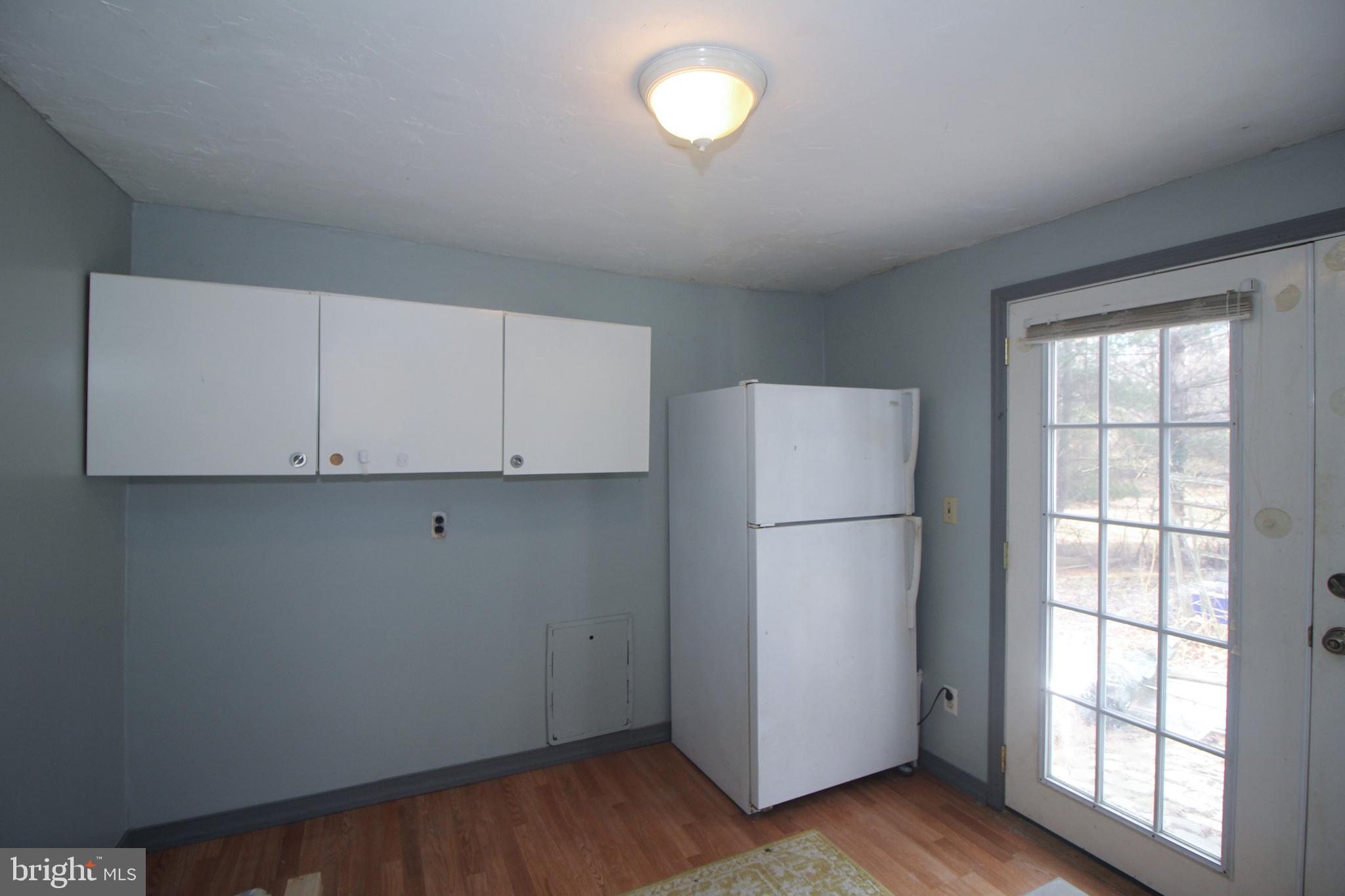 160 Funk Road Port Deposit, MD 21904 - Photo 41 of 51 an empty room with wooden floor and window