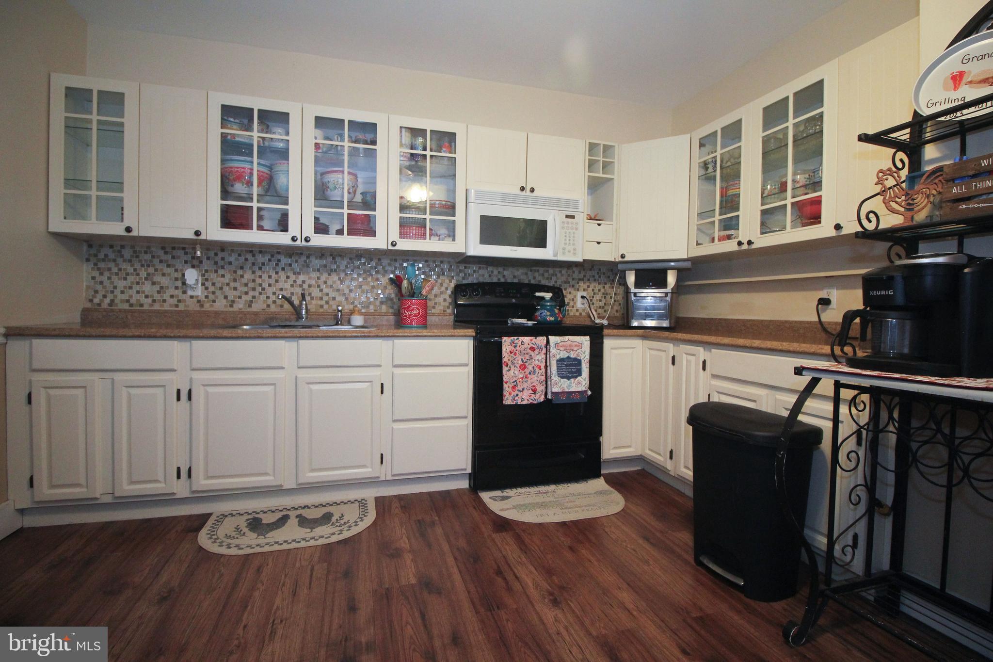 160 Funk Road Port Deposit, MD 21904 - Photo 45 of 51 a kitchen with stainless steel appliances granite countertop a stove and cabinets