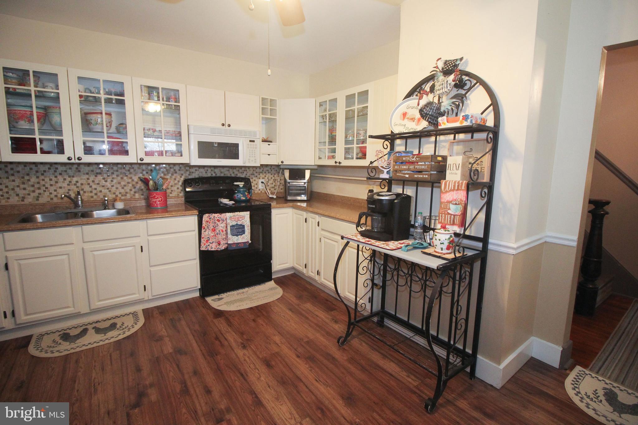 160 Funk Road Port Deposit, MD 21904 - Photo 48 of 51 a kitchen with stainless steel appliances a stove top oven and a sink