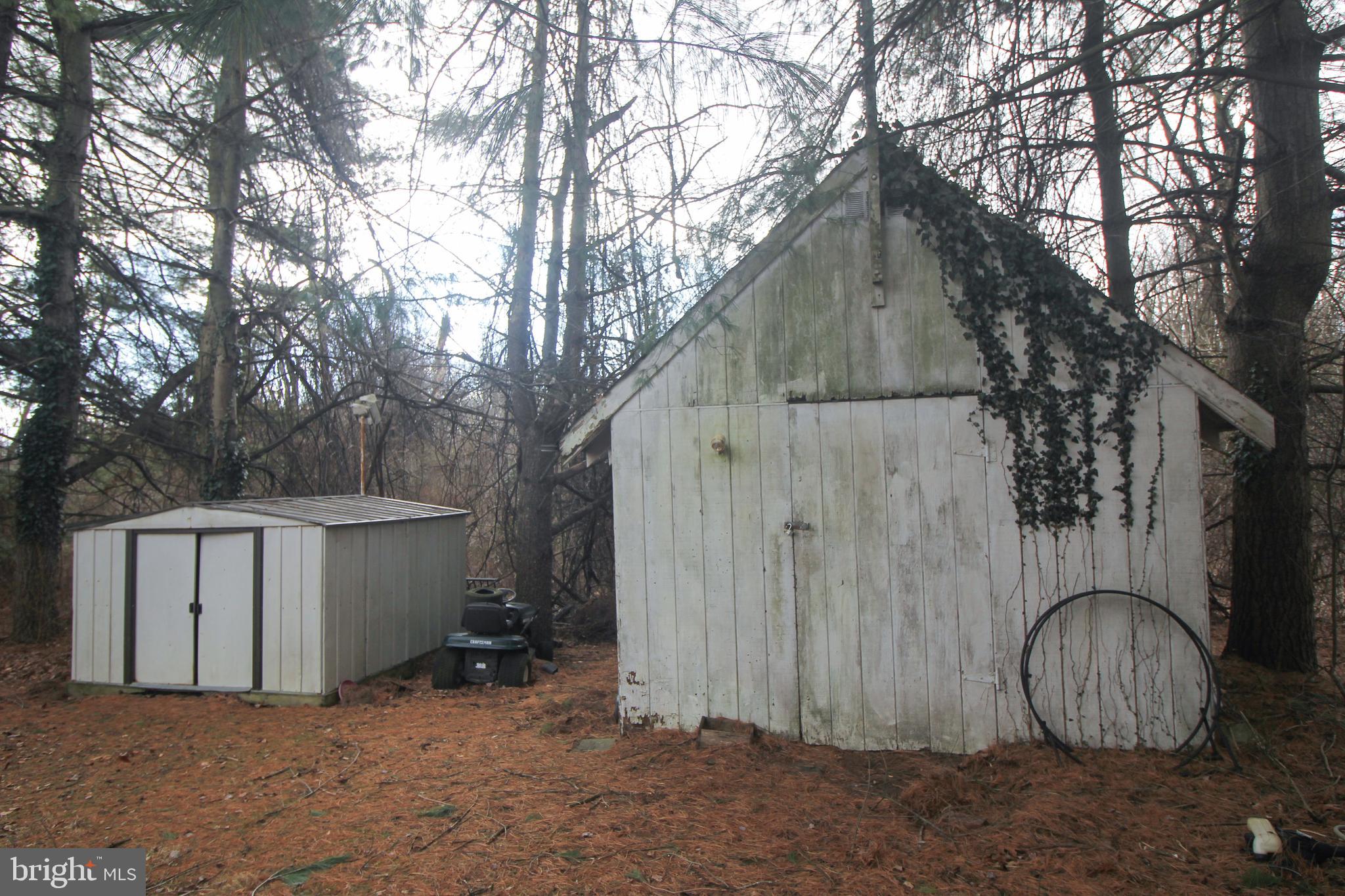 160 Funk Road Port Deposit, MD 21904 - Photo 9 of 51 a view of a house with a backyard and tree