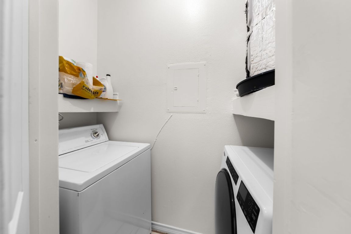 3001 Cedar Street, Unit 310 Austin, TX 78705 - Photo 14 of 27 a utility room with dryer and washer