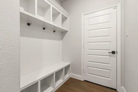 a view of an empty walk in closet