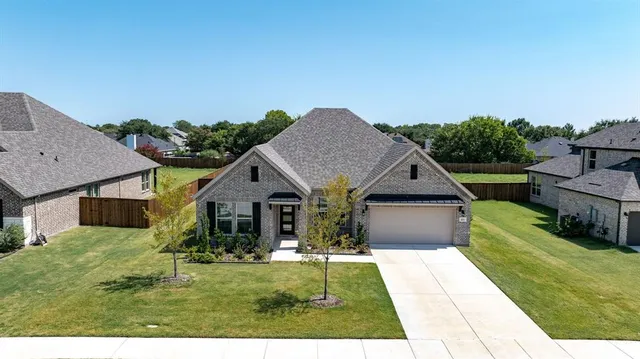 a house view with a garden space