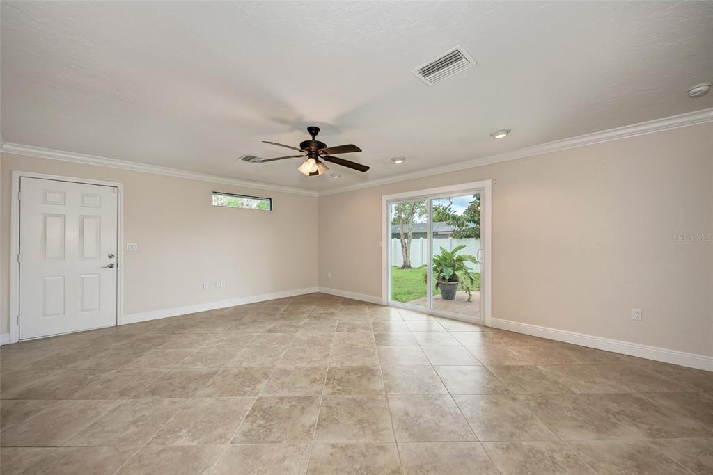 1330 Georgetowne Circle Sarasota, FL 34232 - Photo 20 of 46 a view of an empty room with a window