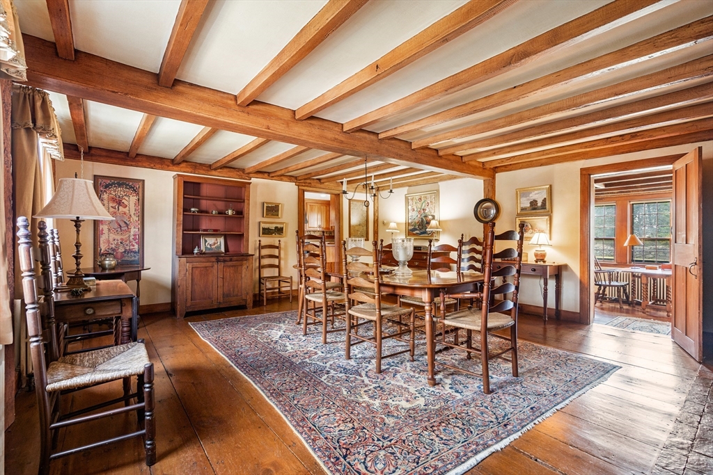 34 Miles River Road Hamilton, MA 01982 - Photo 11 of 42 a dining room with furniture and wooden floor