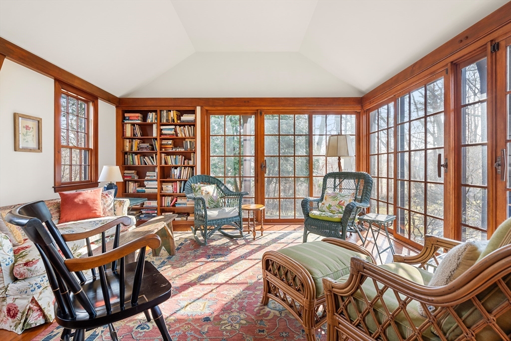34 Miles River Road Hamilton, MA 01982 - Photo 14 of 42 a living room with furniture and a floor to ceiling window