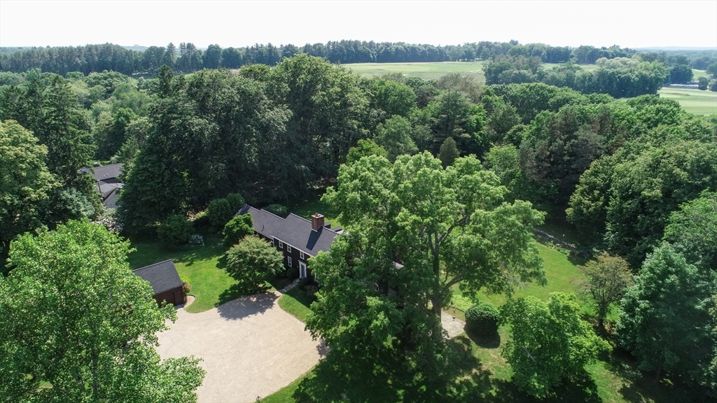 34 Miles River Road Hamilton, MA 01982 - Photo 2 of 42 an aerial view of a house with mountain view