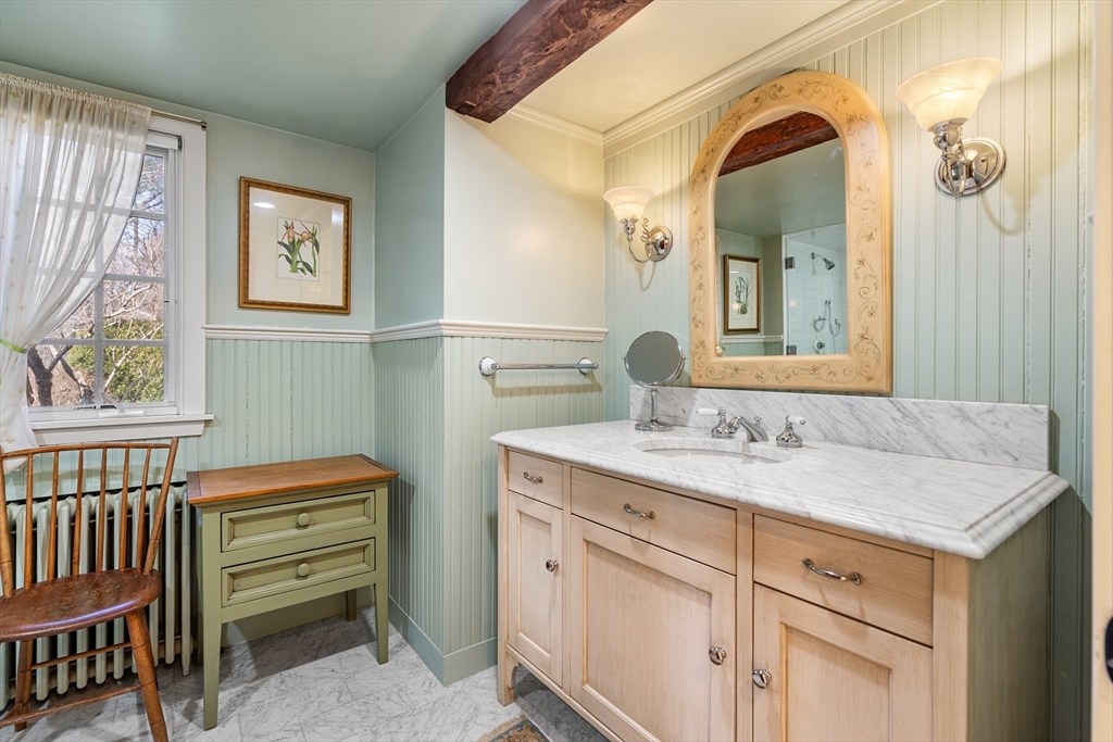34 Miles River Road Hamilton, MA 01982 - Photo 23 of 42 a bathroom with a sink a vanity and a mirror