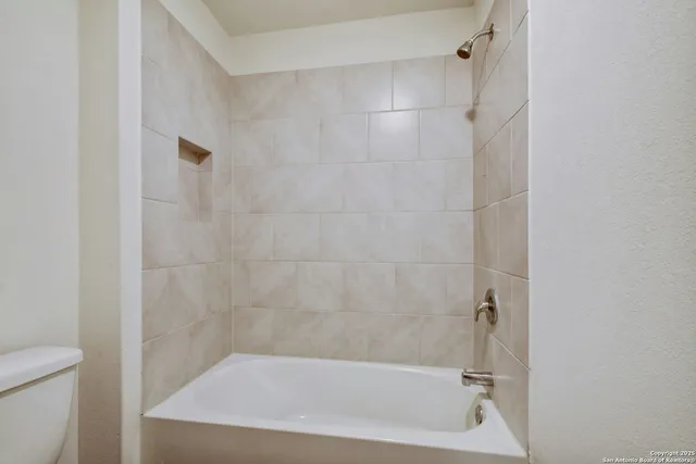 a bathroom with a bathtub