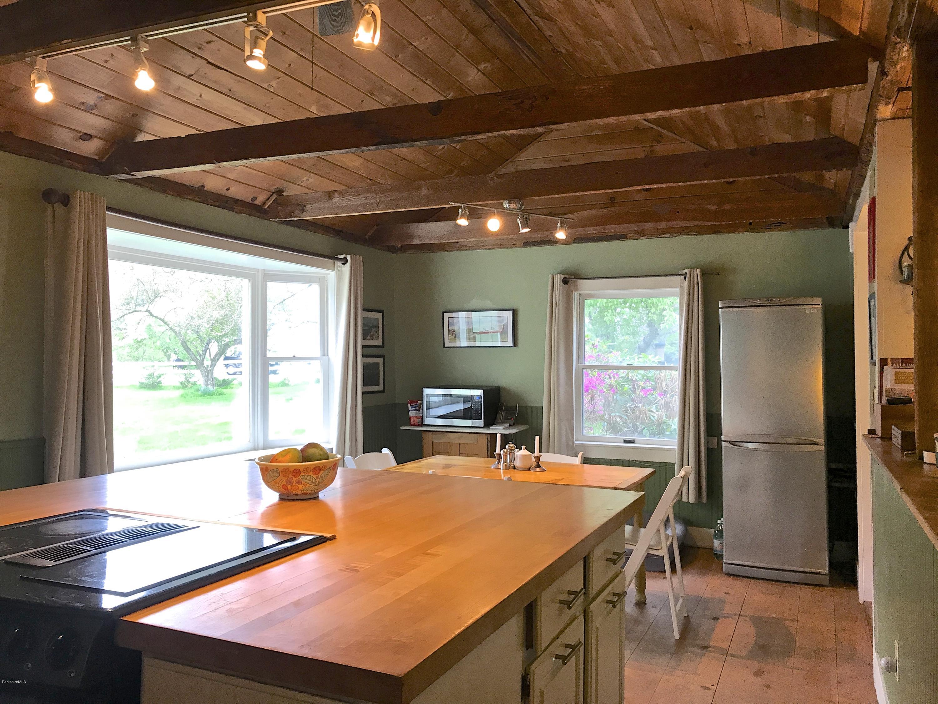 59 Salisbury Road Sheffield, MA 01257 - Photo 26 of 45 a dining room with a table and chairs