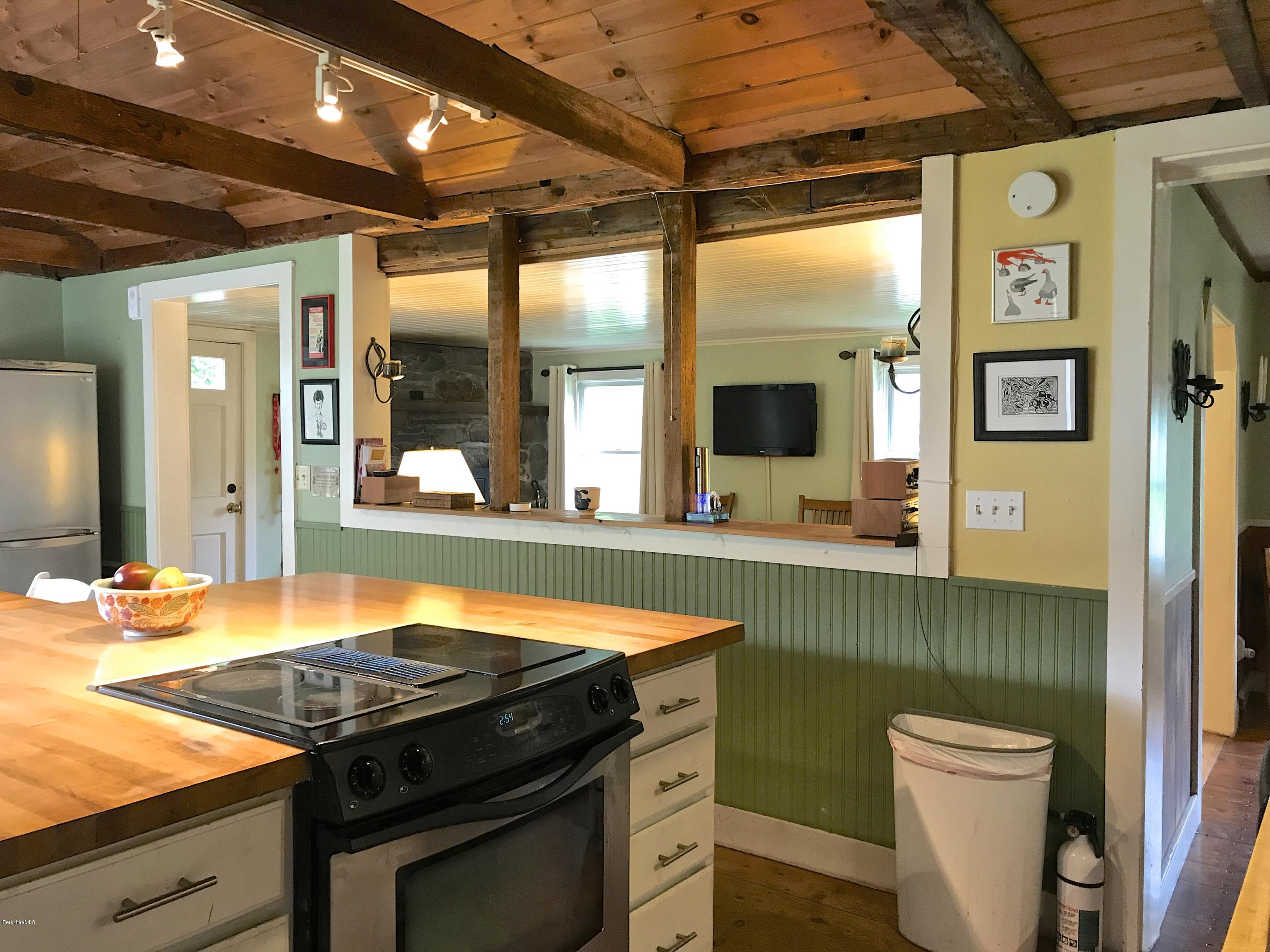 59 Salisbury Road Sheffield, MA 01257 - Photo 29 of 45 a kitchen with a stove and a sink