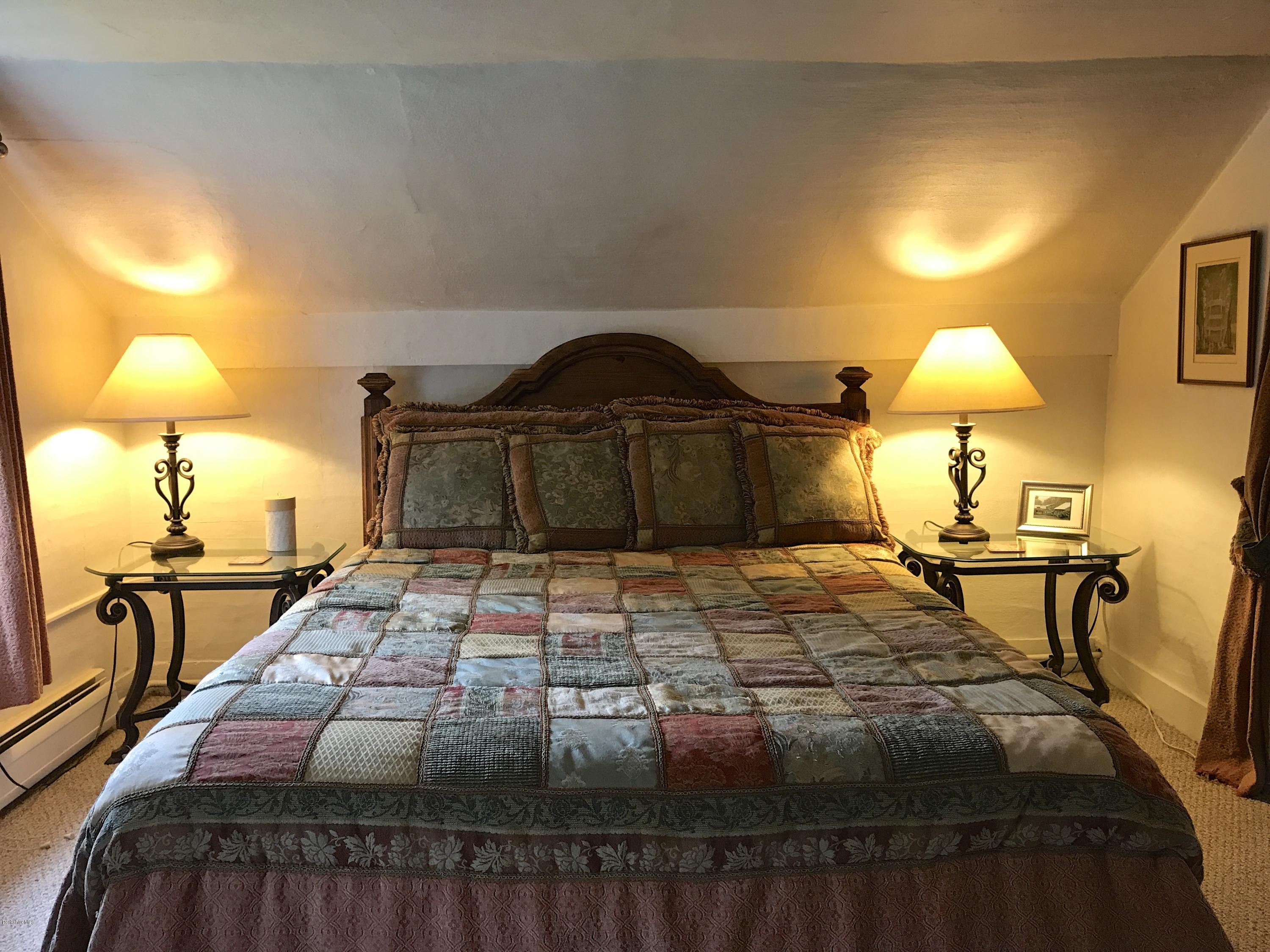 59 Salisbury Road Sheffield, MA 01257 - Photo 42 of 45 a bedroom with a bed and lamp on table