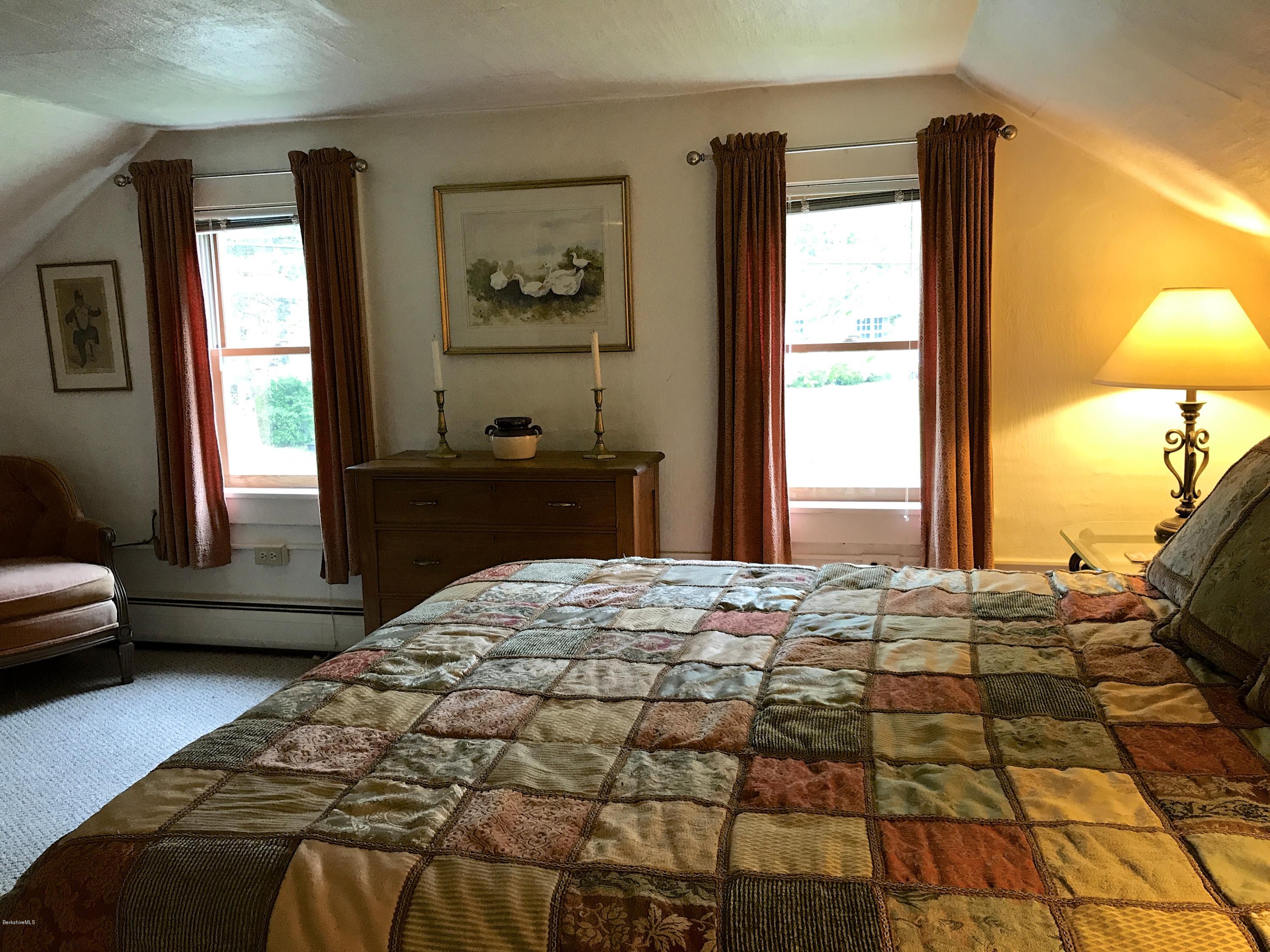 59 Salisbury Road Sheffield, MA 01257 - Photo 43 of 45 a bedroom with a bed and a window