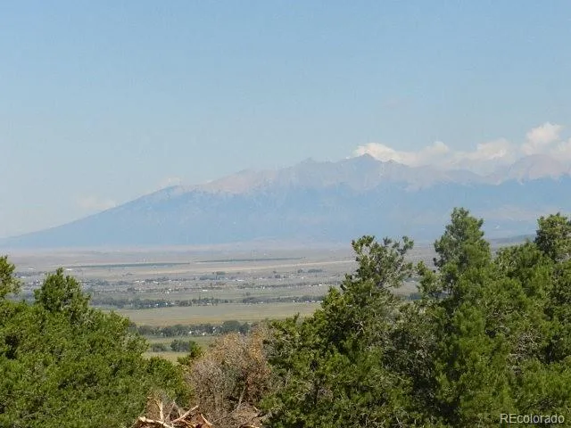 a view of a large body of water and beach