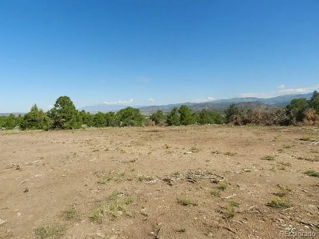 a view of beach and mountain