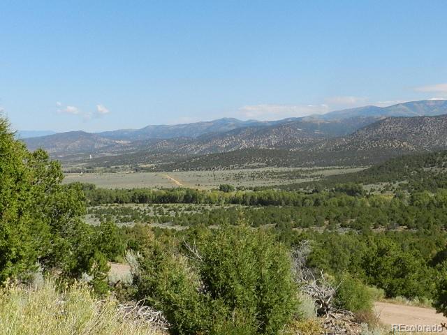 8-9 Mountain Rdg Lane San Luis, CO 81152 - Photo 17 of 29 a view of a town with mountains in the background
