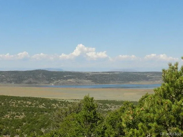 a view of outside space with a lake view