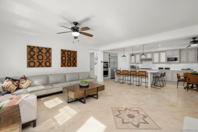 a living room with furniture and a table