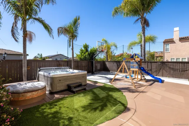 a view of a swimming pool with a lounge chairs