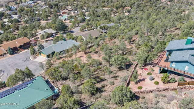 an aerial view of residential house with outdoor space
