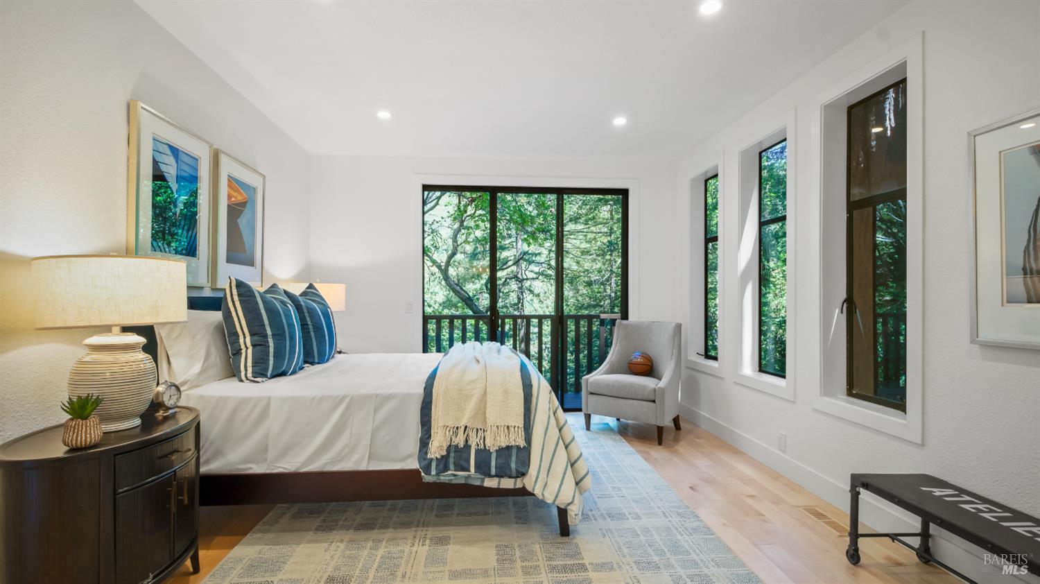 580 Ralston Avenue Mill Valley, CA 94941 - Photo 33 of 50 a bedroom with furniture and large windows