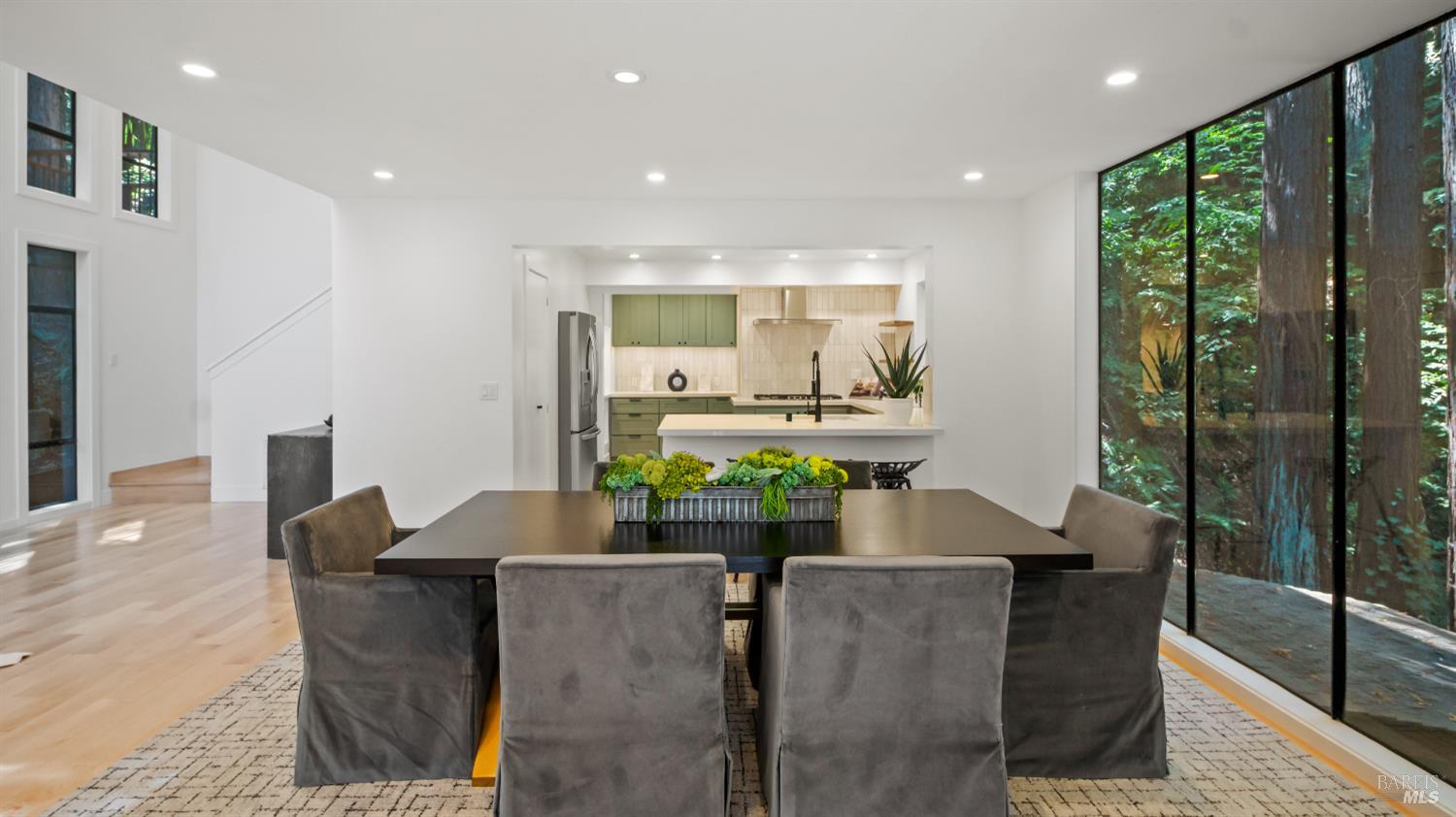 580 Ralston Avenue Mill Valley, CA 94941 - Photo 4 of 50 a dining room with furniture and a floor to ceiling window