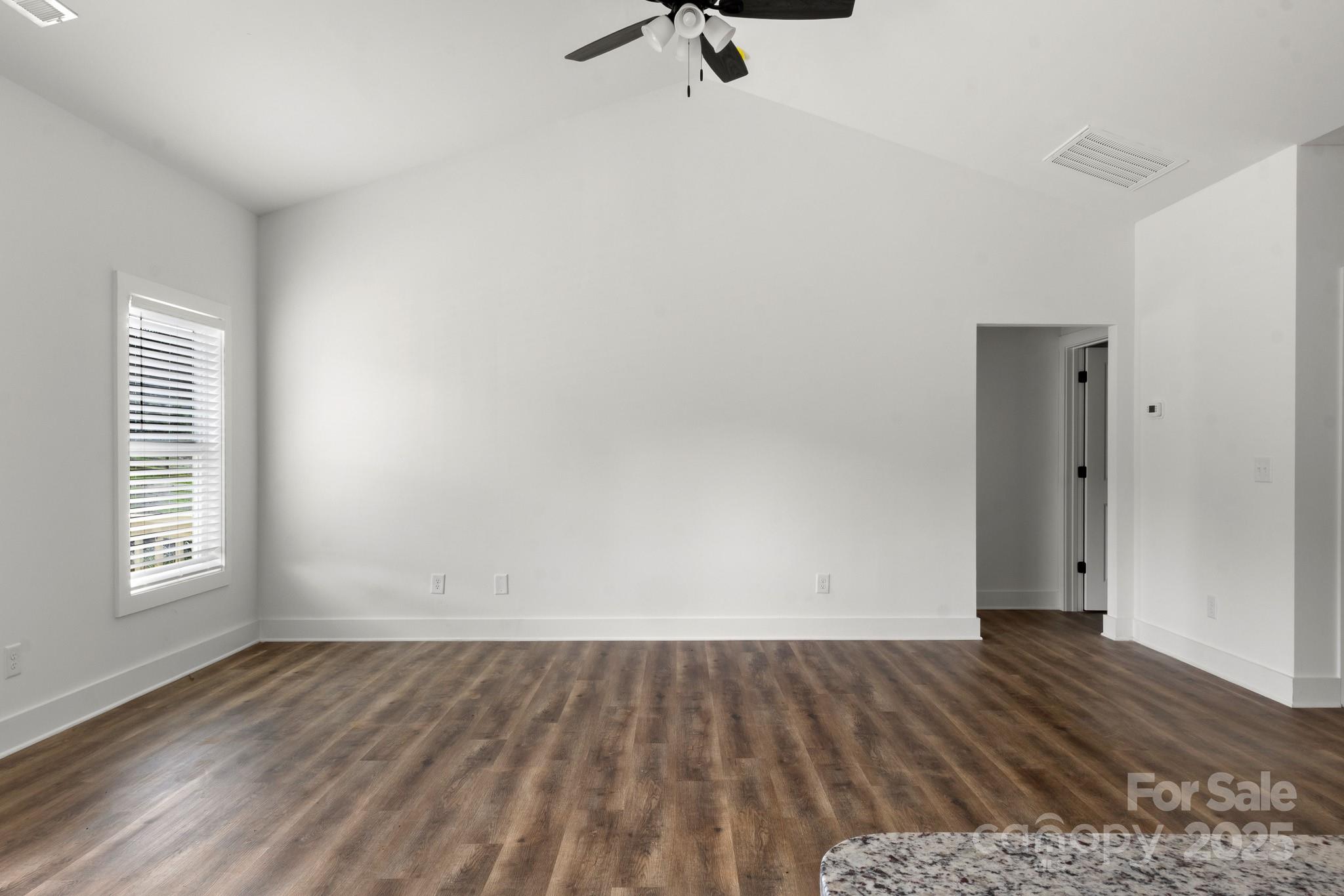 2508 Rock Dam Road Harmony, NC 28634 - Photo 29 of 32 wooden floor in an empty room