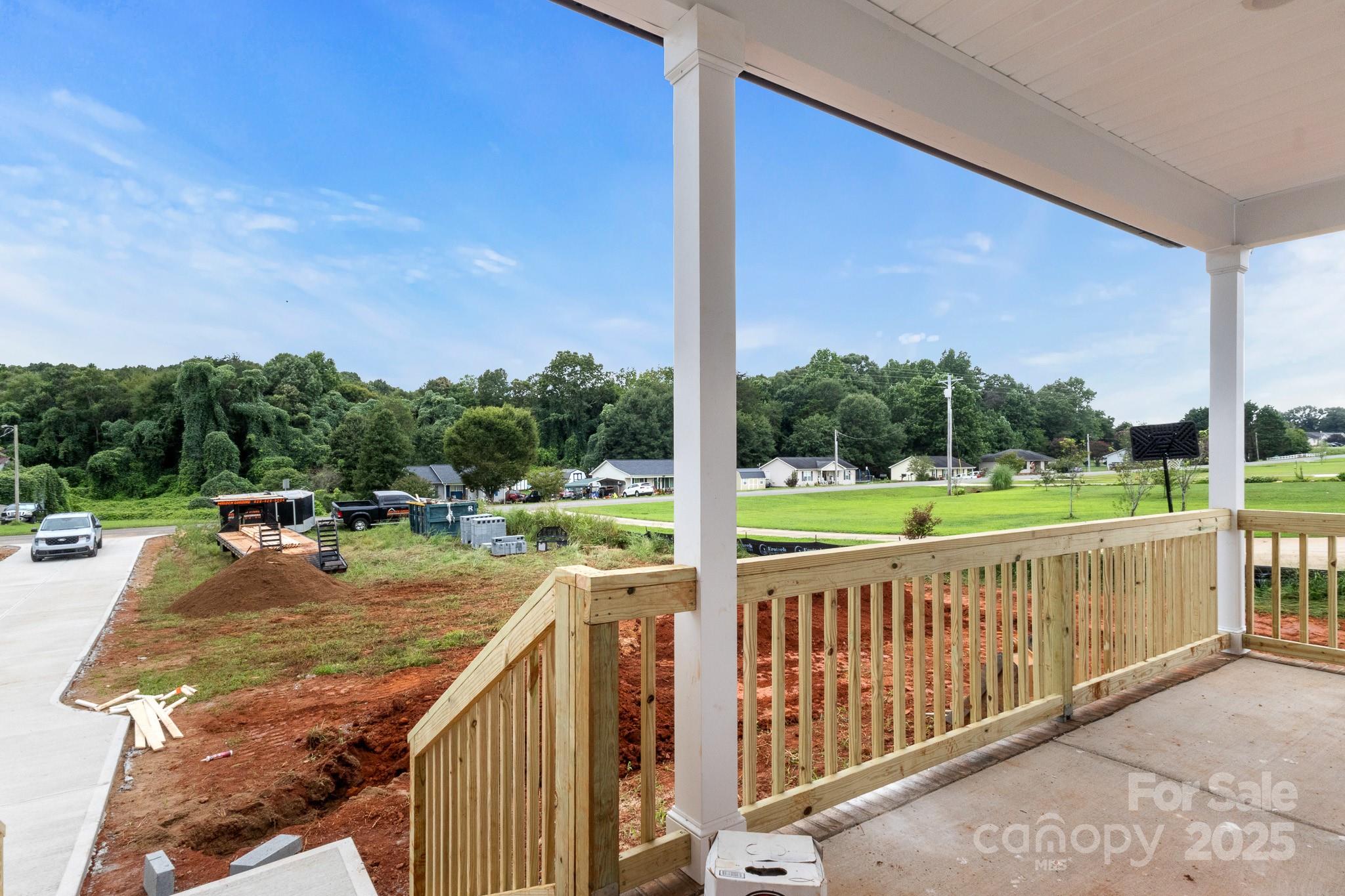 2508 Rock Dam Road Harmony, NC 28634 - Photo 3 of 32 a view of a balcony with floor to ceiling windows