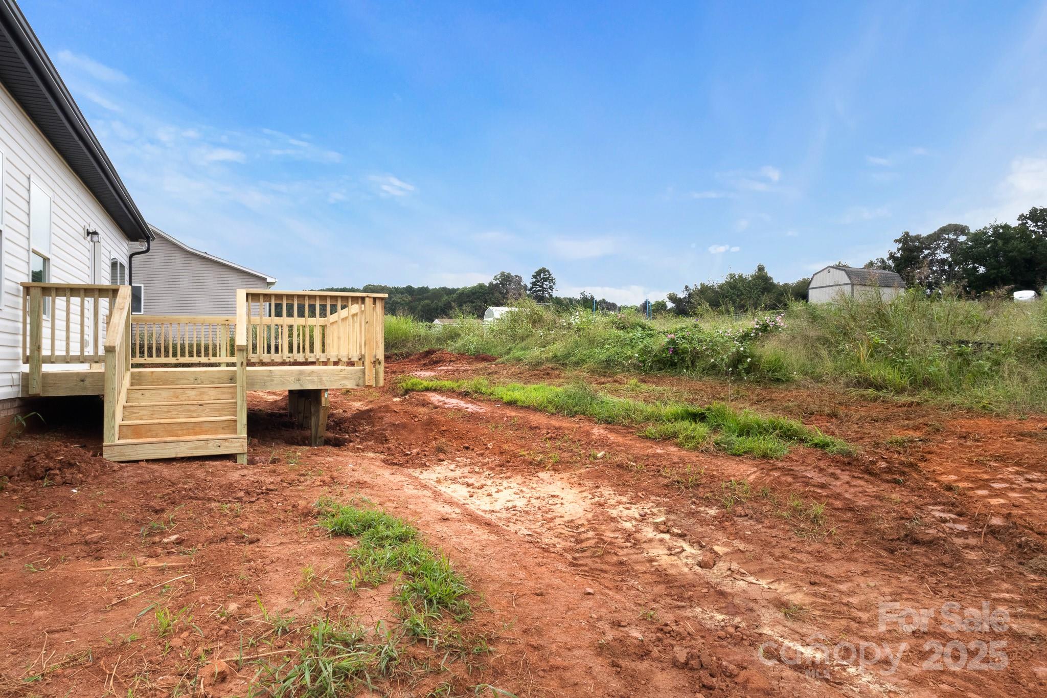 2508 Rock Dam Road Harmony, NC 28634 - Photo 32 of 32 a front view of a house with a yard