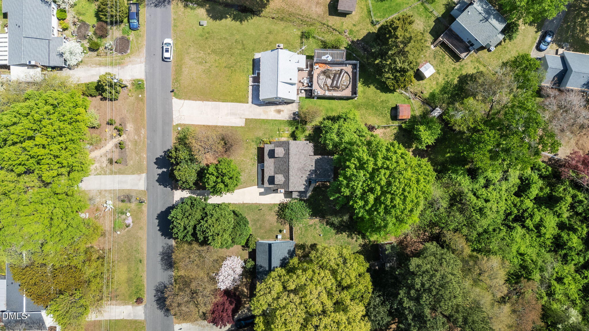 804 Olive Street Apex, NC 27502 - Photo 46 of 60 an aerial view of a house with a yard and garden